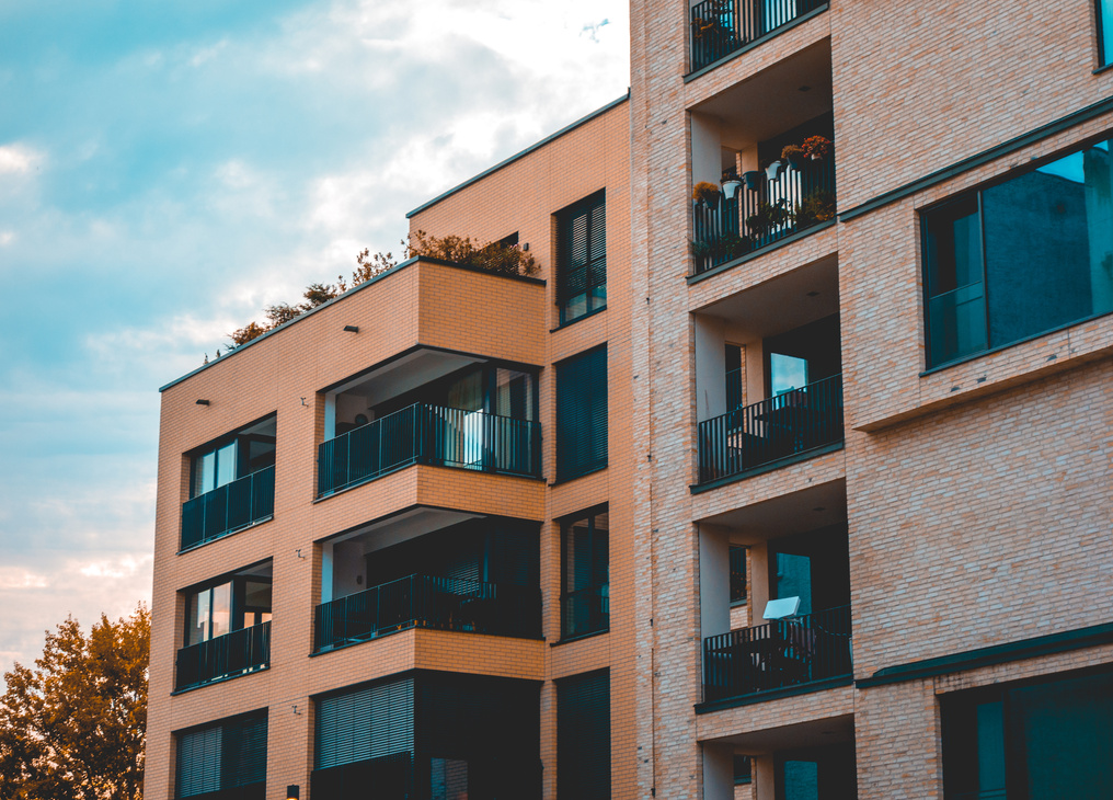 two luxury and modern apartment houses next to each other